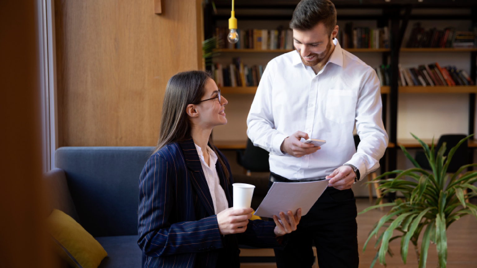 Hospitality consultants in India reviewing a hotel operations checklist.